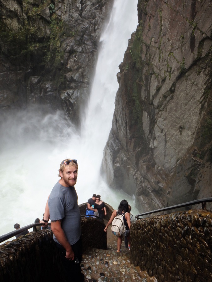 Rhys making his way down the steps close to the base of the waterfall